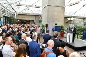 Ashley Wheaton delivers speech at the University of the Built Environment's launch party at the Barbican Centre